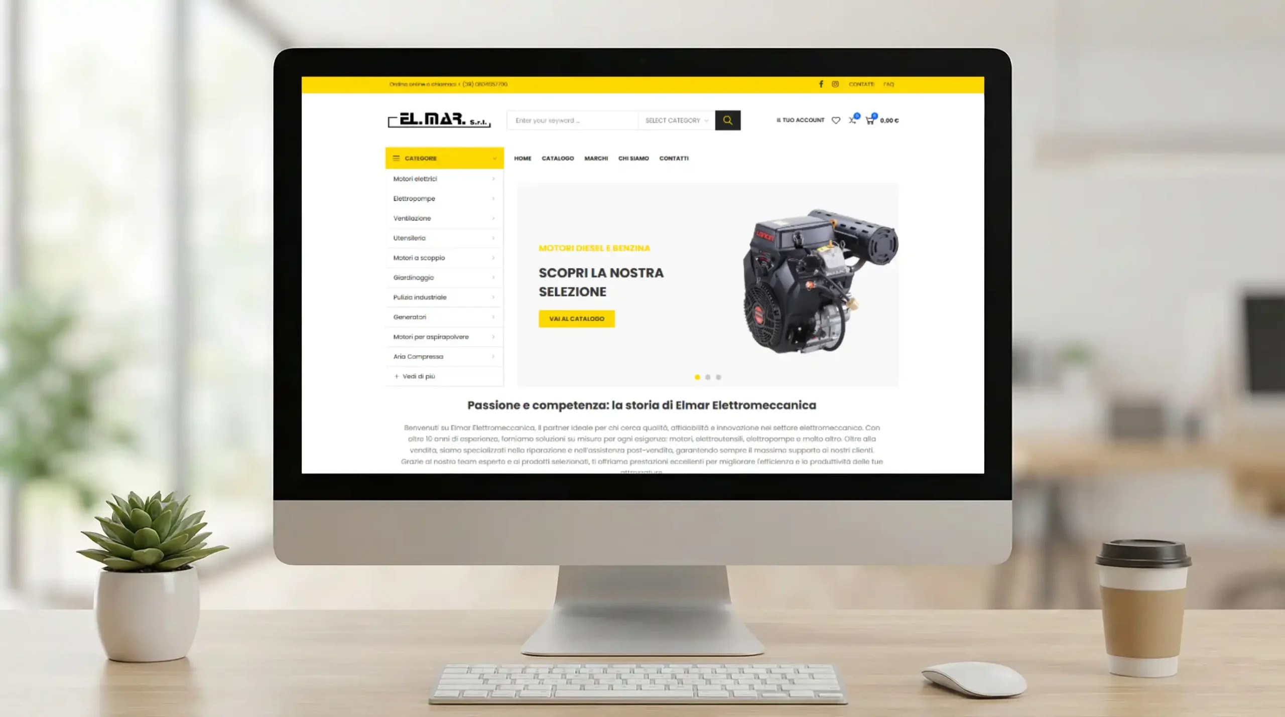 Mockup realistico di un computer desktop posizionato su una scrivania di legno, che visualizza sullo schermo la homepage del sito web di "EL.MAR. S.r.l." con un banner dedicato ai motori diesel e benzina.